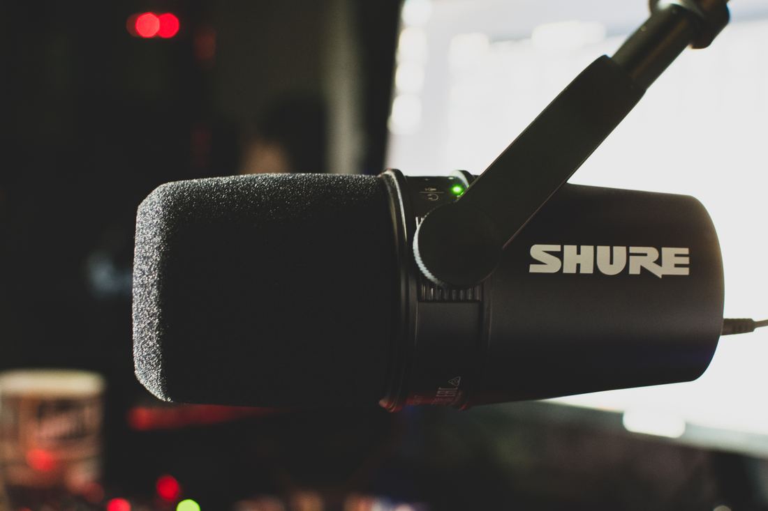A podcast microphone on a stand